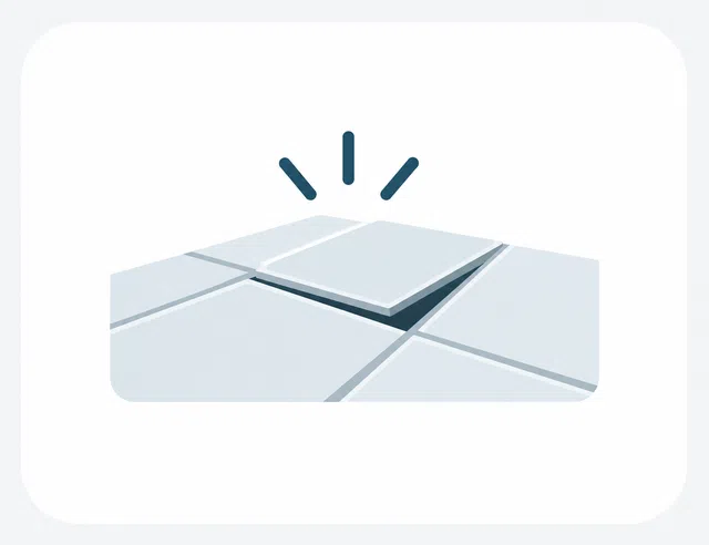 Illustration of a loose floor tile sitting above the tiles around it