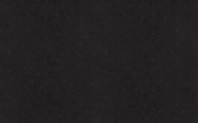 a black and white image of a black surface