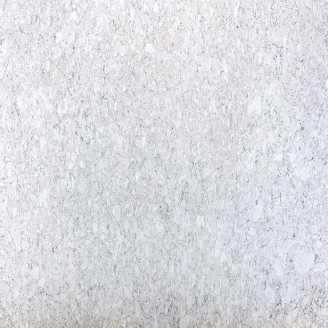 a white surface with a dark background