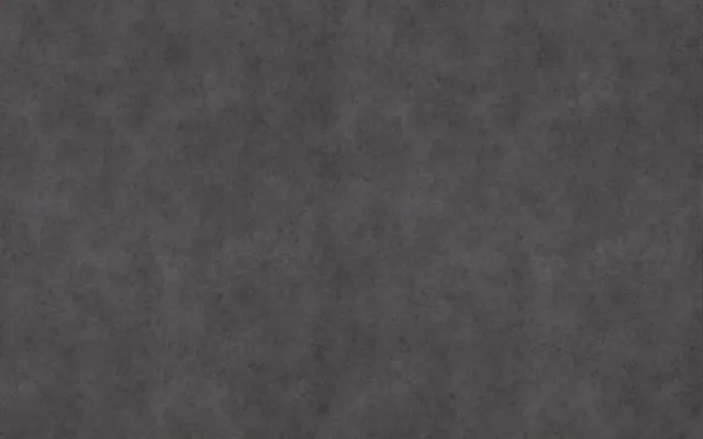a grey surface with a dark background