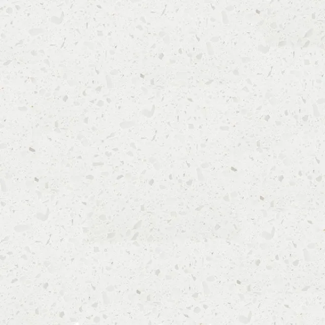 a white surface with small specks