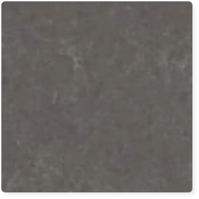 a grey surface with a black background