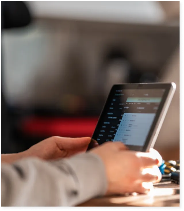 a person holding a tablet
