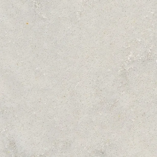 a white surface with a speckled surface