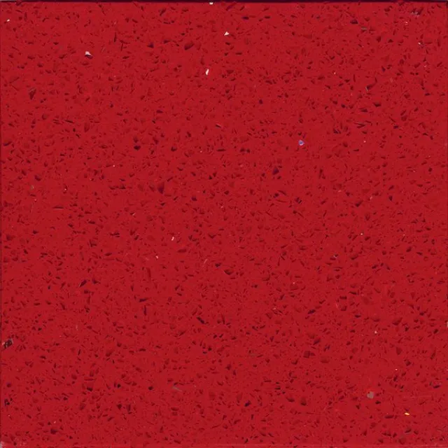 a red surface with small specks