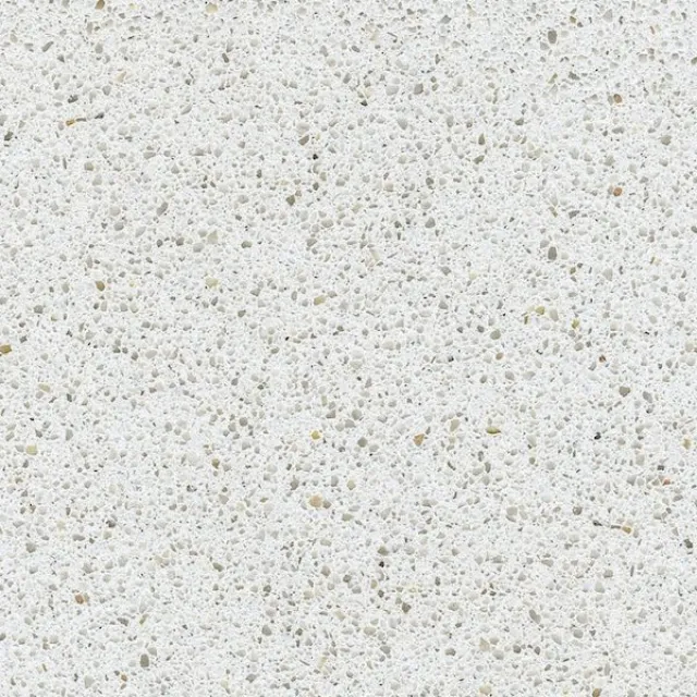a white surface with small specks
