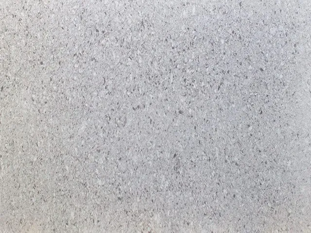 a close up of a grey surface