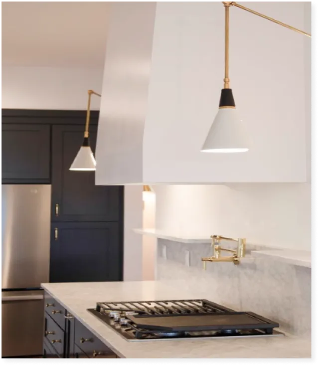 a kitchen with a stove and a refrigerator