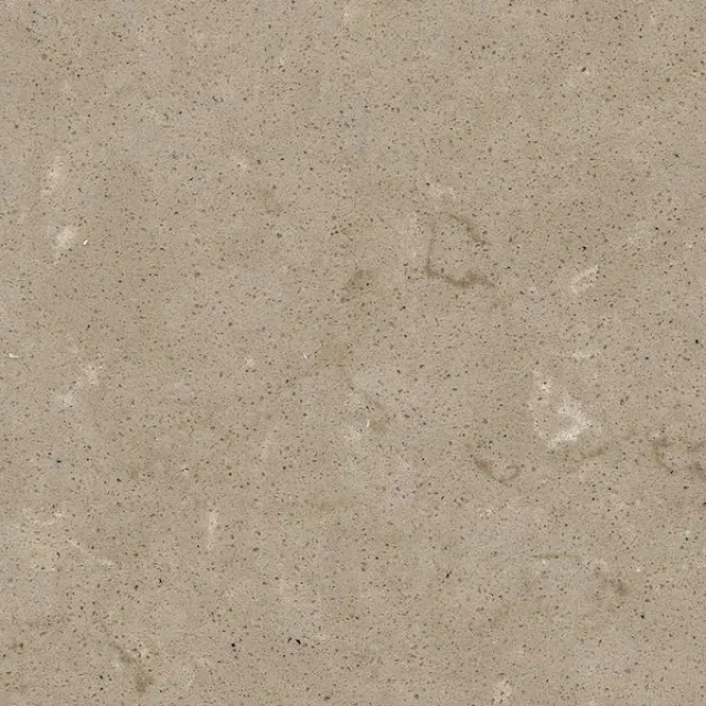 a white surface with a black speckled surface