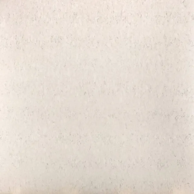 a white surface with a dark background