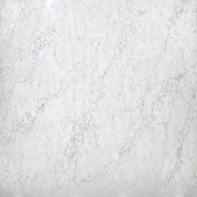 a white surface with a dark background