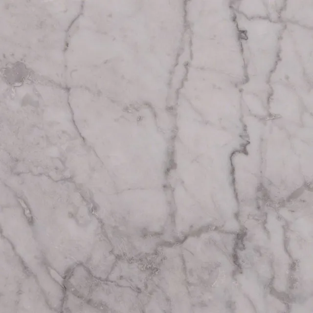 a white surface with cracks