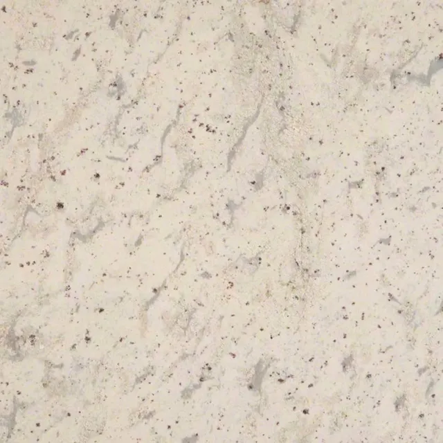 a white surface with small specks