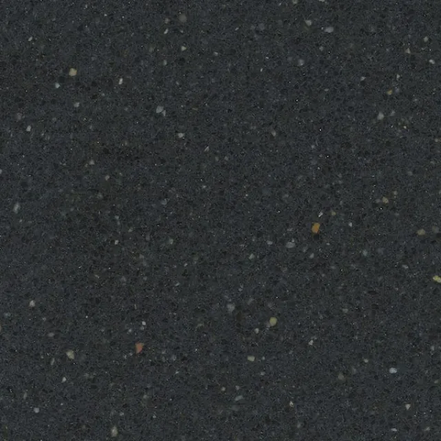 a black surface with small leaves