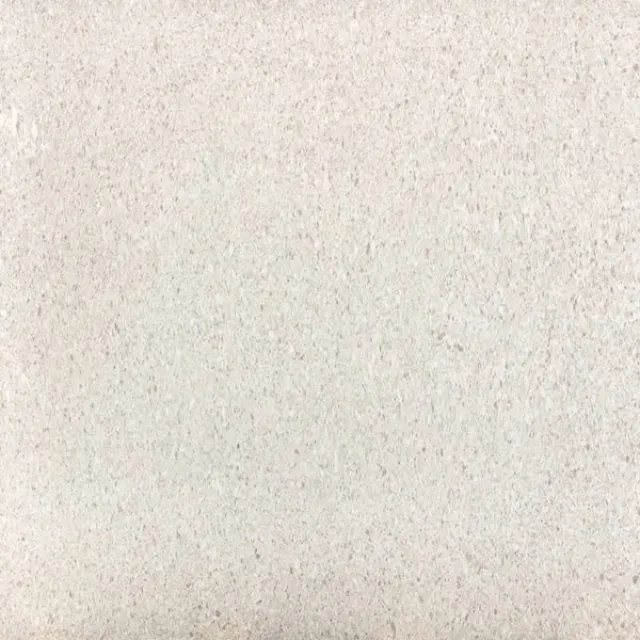 a white surface with a dark background