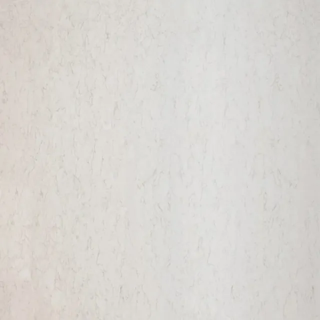 a white surface with a dark background
