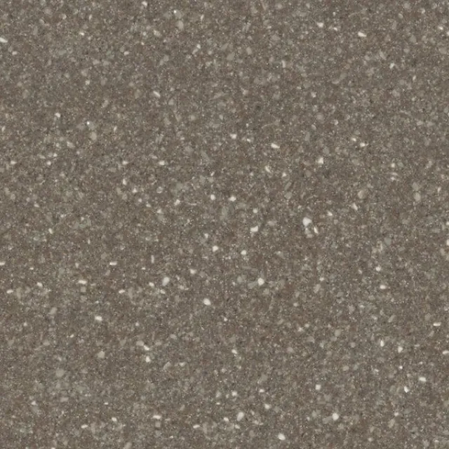 a black and white photo of a black surface with white specks
