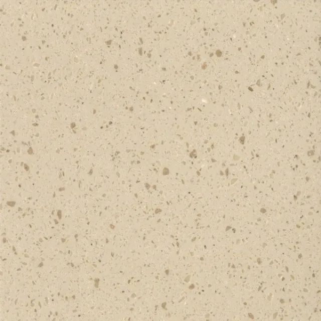 a white surface with small specks