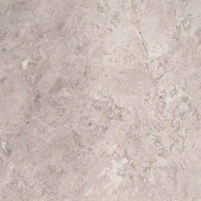 a white surface with cracks