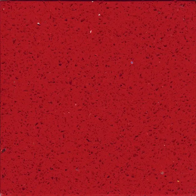 a red surface with small specks