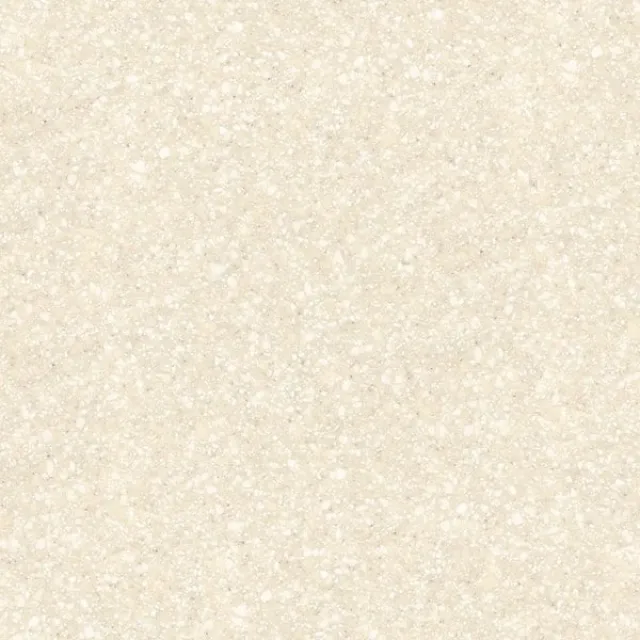 a white surface with small specks
