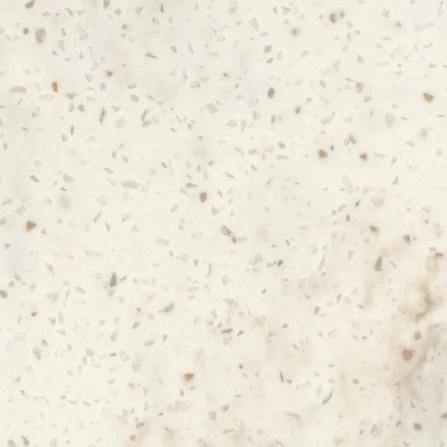 a white surface with small specks