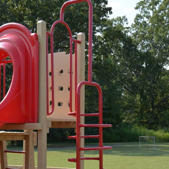 a red and white play structure