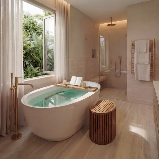 Modern bathroom with a freestanding bathtub, wooden stool, open window, and neutral decor with greenery outside