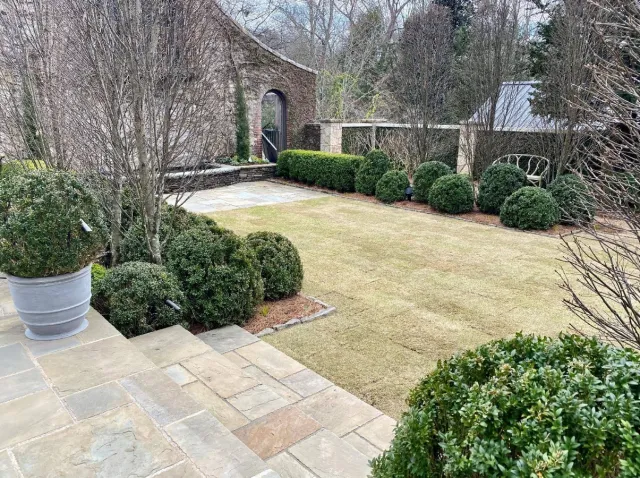 a stone path in a garden