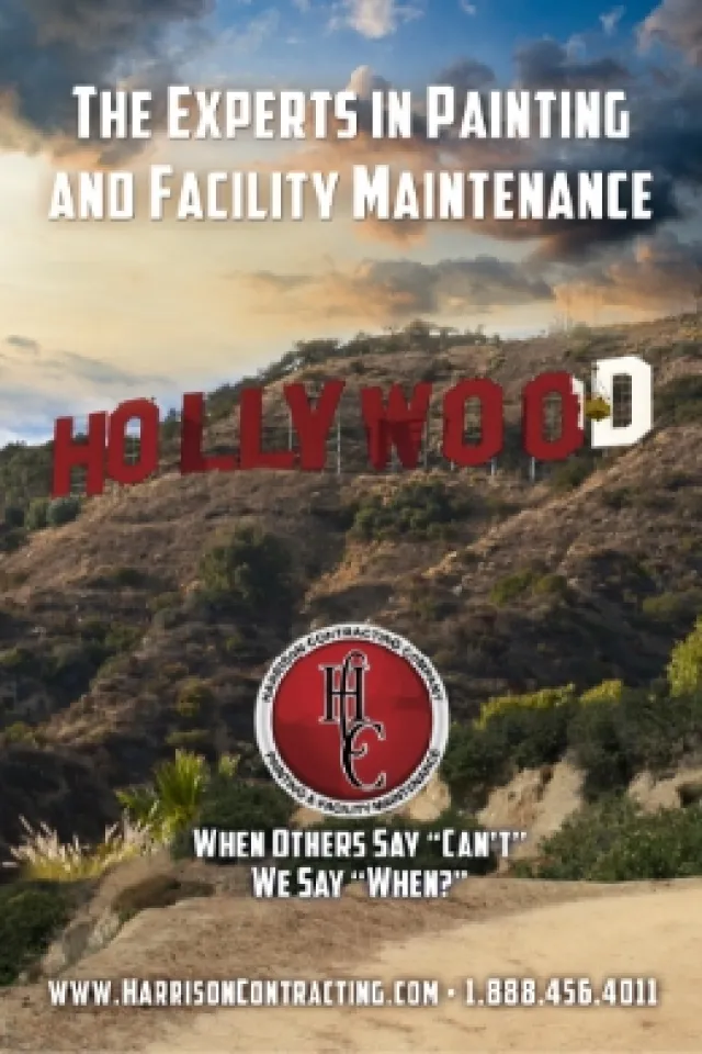 Hollywood sign with red and white paint, advertising expert painting and facility maintenance services by Harrison Contracting.