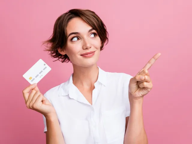 a person holding a card