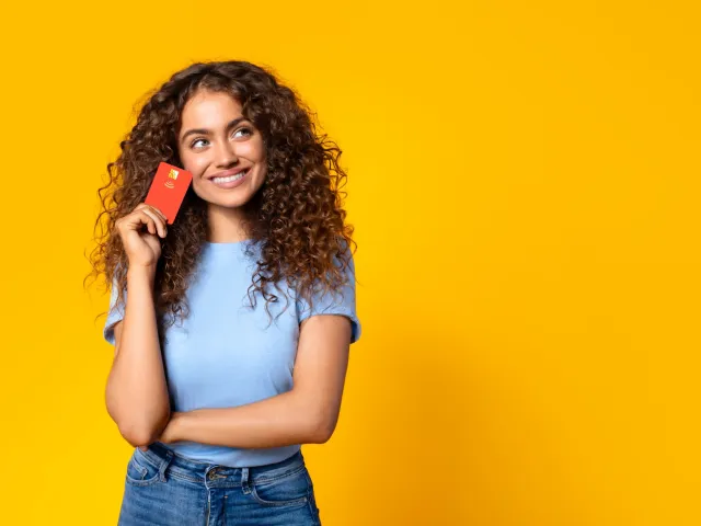 a woman holding a phone