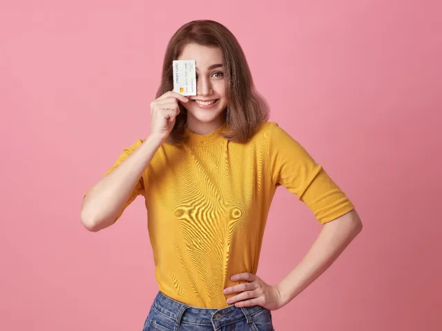 a woman holding a phone to her ear