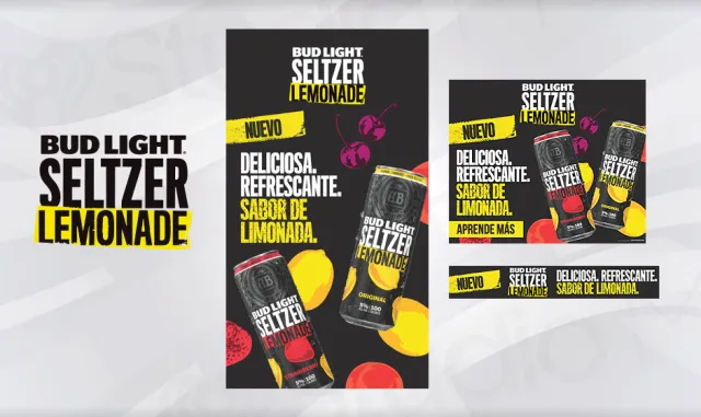 Bud Light Seltzer Lemonade cans with lemons and cherries, highlighting refreshing lemonade flavor in Spanish.