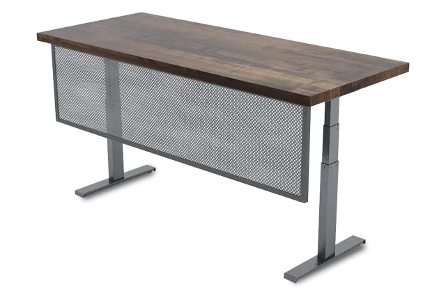 Modern adjustable height office desk with wooden top and metal mesh modesty panel