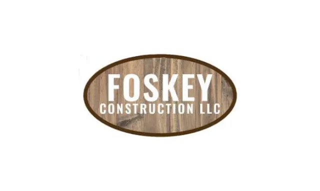 Foskey Construction LLC logo with white text on a wood texture background inside a brown oval border.
