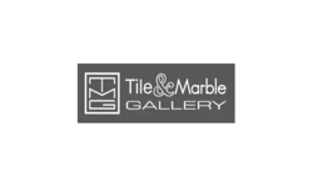 Tile & Marble Gallery logo with stylized TMG initials in a gray rectangular background