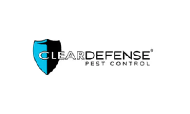 Clear Defense Pest Control logo with a blue and black shield symbol and bold text on white background