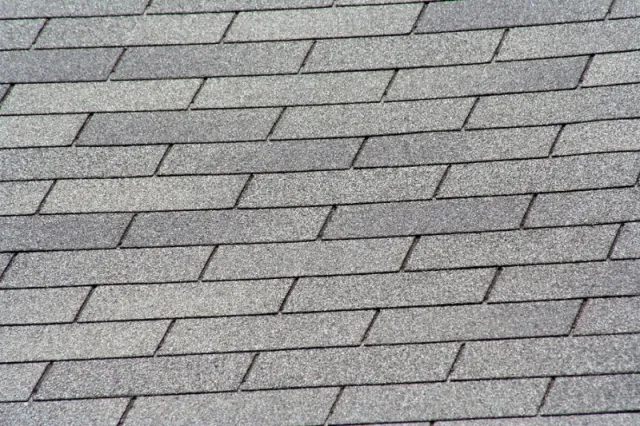 a cobblestone road with a cobblestone cobblestone sidewalk