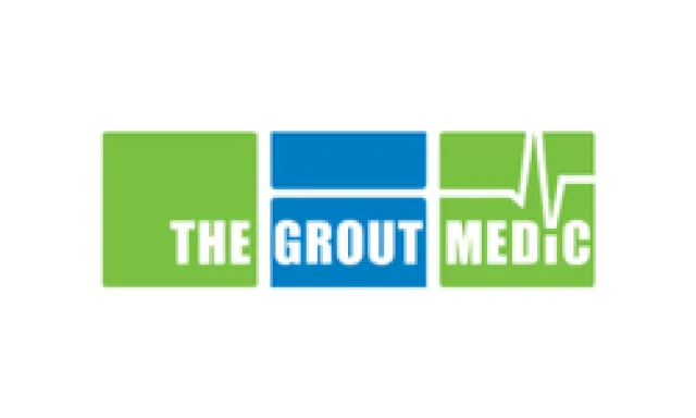 Logo for The Grout Medic featuring green and blue blocks with white text and a heartbeat line.