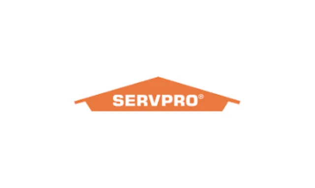 SERVPRO logo with orange roof shape and white text on a white background