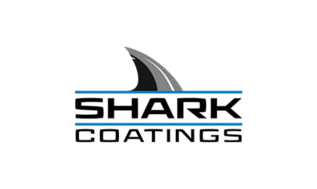 Logo of Shark Coatings with a shark fin above bold black text and blue horizontal lines on white background