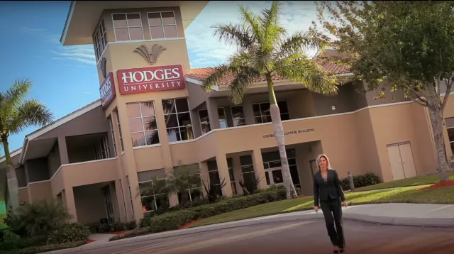 a person standing in front of a building