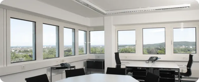 a room with a table and chairs
