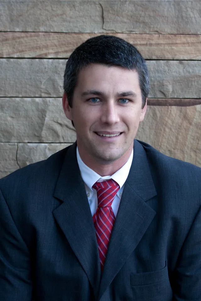 a man in a suit and tie