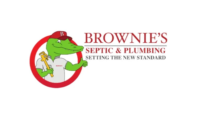 Logo of Brownie's Septic & Plumbing featuring a cartoon alligator with a wrench inside a red circle
