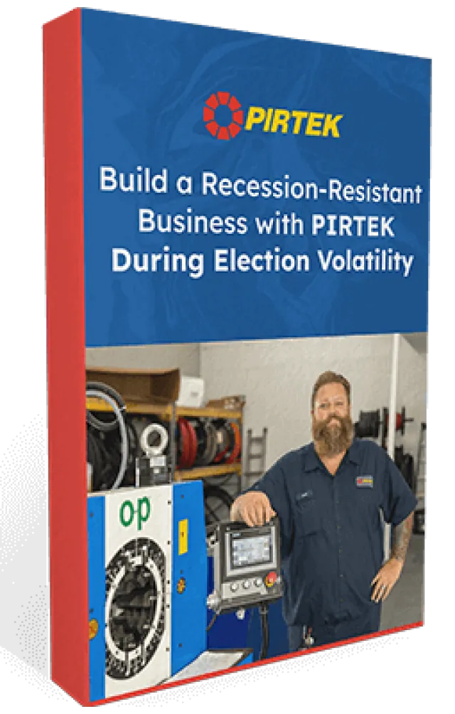 Man smiling in workshop showcasing PIRTEK business opportunities during election volatility and recession resistance.