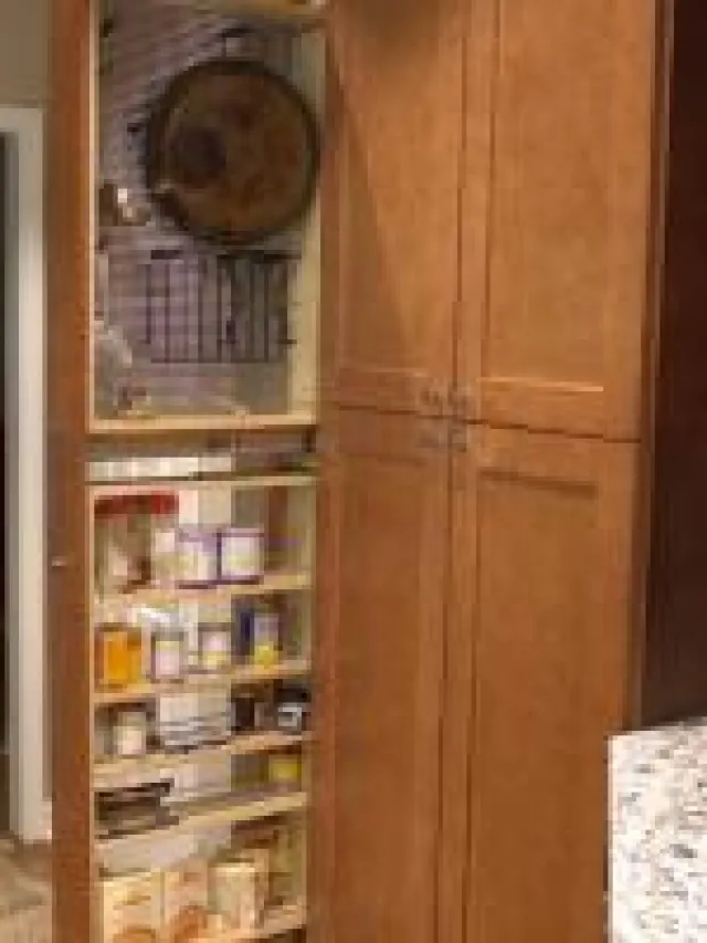 a stainless steel refrigerator in a room