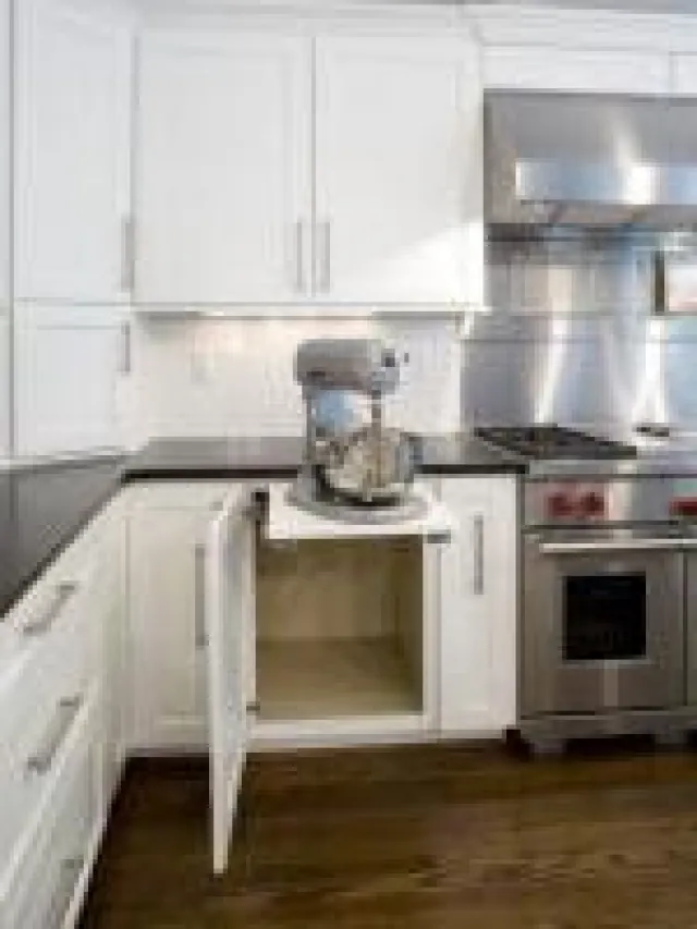 a stove top oven sitting inside of a kitchen