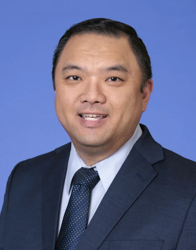 a man in a suit and tie